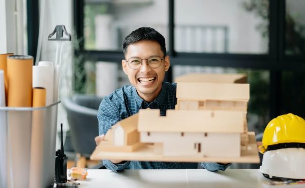 male-architect-hands-making-model-house-man-archi-2024-11-01-23-26-52-utc.jpg